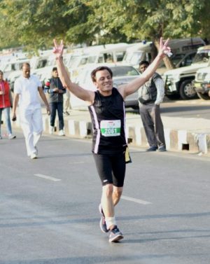 A K Sharma running Marathon